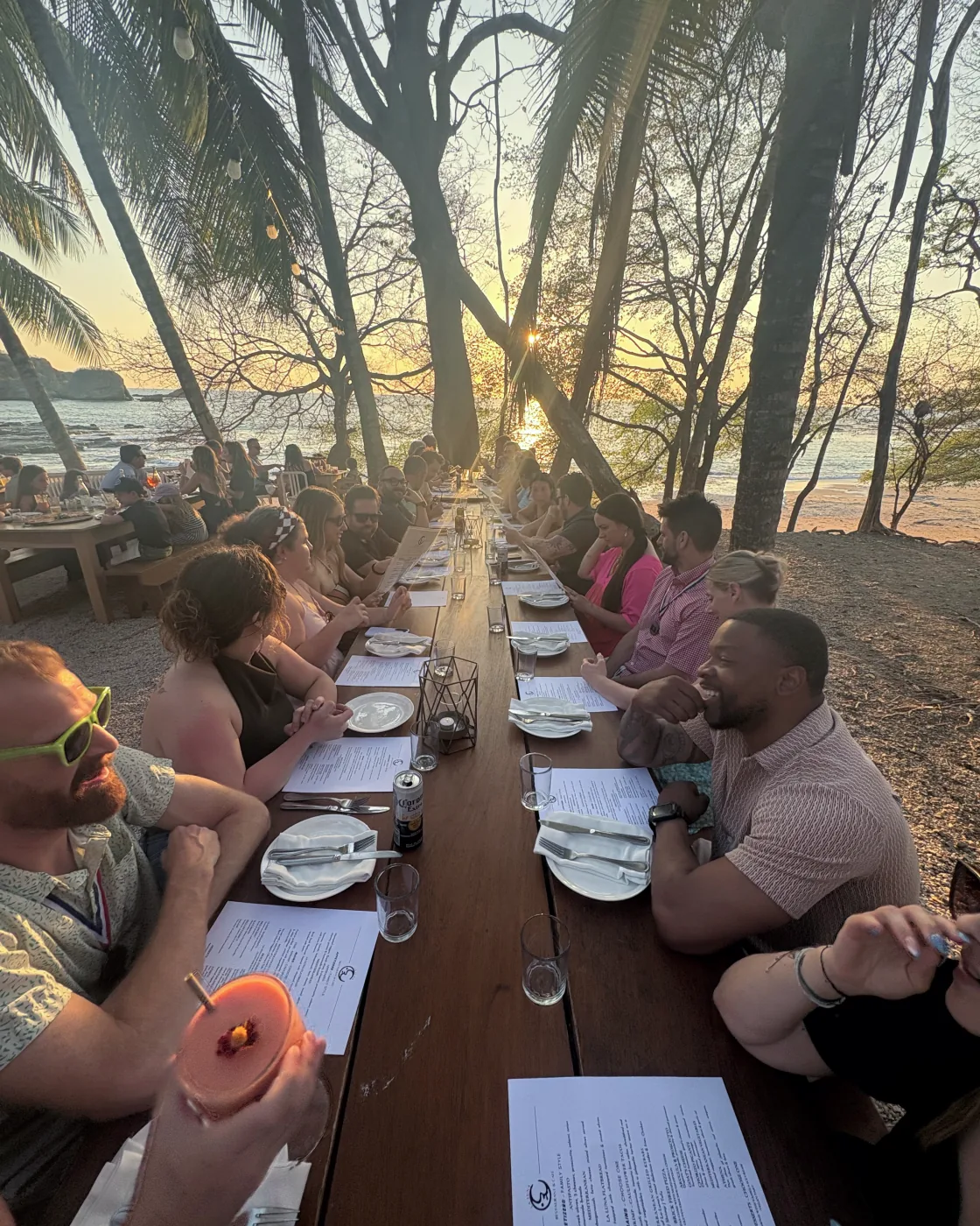 Group dinner at sunset
